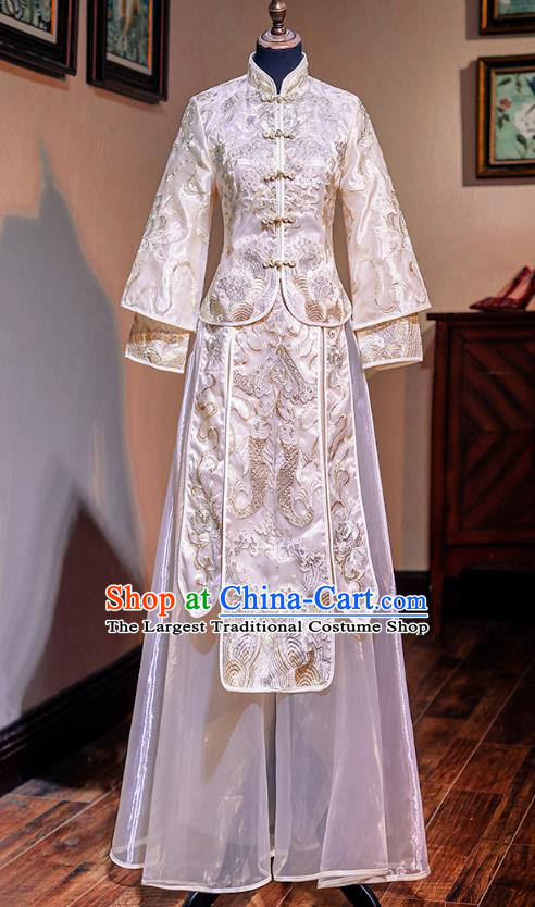 Top Grade Chinese Ancient Bride Embroidered Champagne Xiuhe Suit Traditional Wedding Costumes for Women