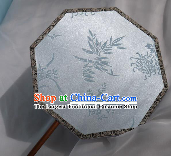 China Classical Plum Orchids Bamboo Chrysanthemum Pattern Palace Fan Traditional Hanfu Fan Handmade Blue Silk Octagon Fan