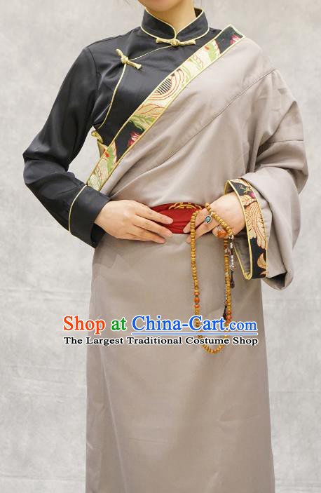 China Zang Nationality Clothing Ethnic Woman Stage Performance Costume Apricot Tibetan Robe
