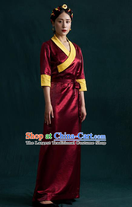 China Traditional Tibetan Ethnic Woman Clothing Zang Nationality Kangba Wine Red Bola Dress