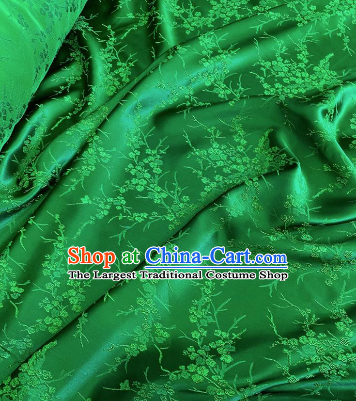 Green China Classical Embossed Plum Blossom Pattern Silk Cheongsam Stretch Fabric Traditional Material